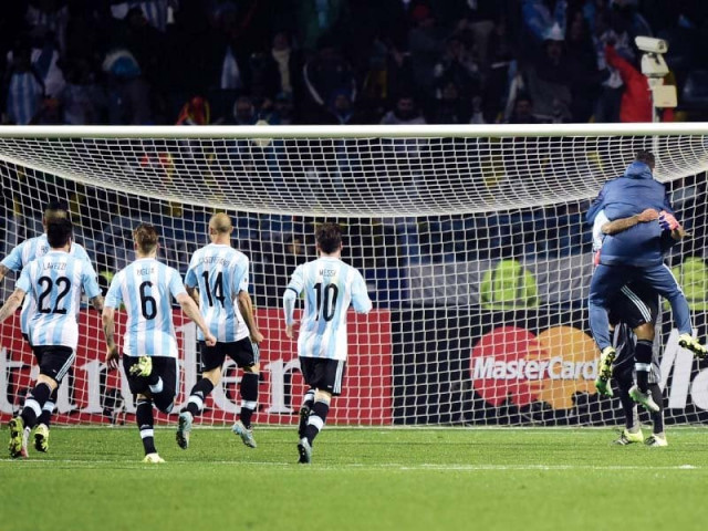 tevez s converted penalty spark wild celebrations as argentina reach the semi finals photo afp tevez s converted penalty spark wild celebrations as argentina reach the semi finals photo afp