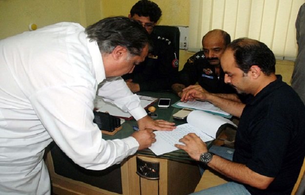 party leaders including imran ismail faisal vawda khurrum sher zaman and dawa khan sabir visited the civil lines police station on saturday to file the application photo ppi
