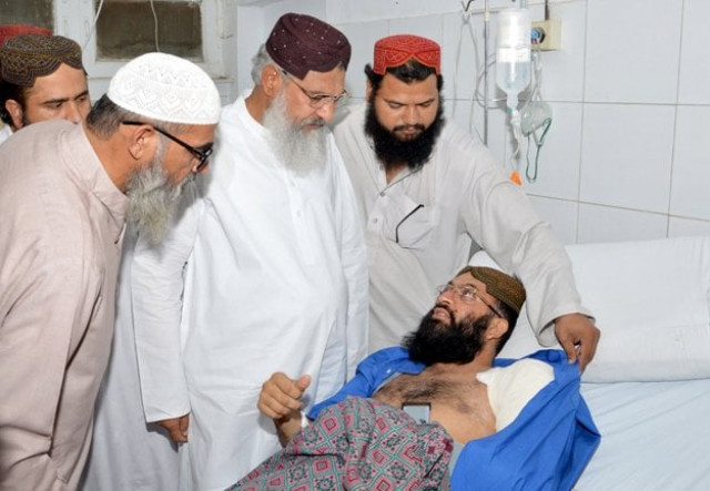 asjw senior member maulana ahmed ludhyanwi to condole the attacked member of asjw ghulam mustafa baloch photo express asjw senior member maulana ahmed ludhyanwi to condole the attacked member of asjw ghulam mustafa baloch photo express