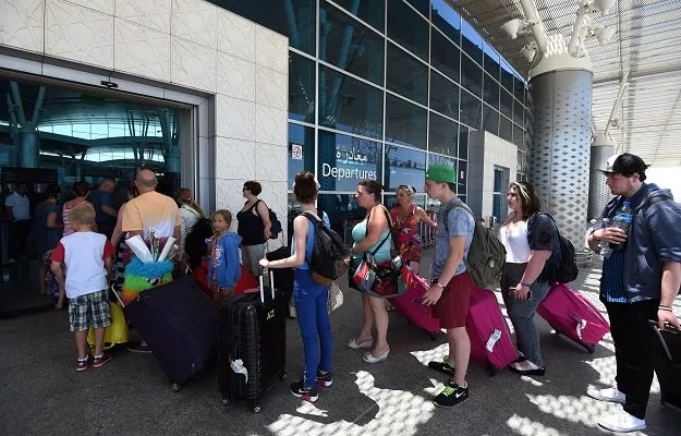 british tourists leave tunisia at the enfidha international airport on june 27 2015 in the aftermath of a shooting attack on the riu imperial marhaba hotel in port el kantaoui photo afp british tourists leave tunisia at the enfidha international airport on june 27 2015 in the aftermath of a shooting attack on the riu imperial marhaba hotel in port el kantaoui photo afp