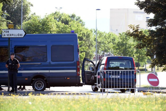 police officers stand guard at a cordon in saint quentin fallavier on june 27 2015 at the site where a decpaitated body was discovered following a suspected islamist attack on us owned air products factory french police interrogated a suspected islamist as they tried to piece together an attack in which the man put his boss 039 s severed head on display in the second jihadist attack to hit france in six months photo afp police officers stand guard at a cordon in saint quentin fallavier on june 27 2015 at the site where a decpaitated body was discovered following a suspected islamist attack on us owned air products factory french police interrogated a suspected islamist as they tried to piece together an attack in which the man put his boss 039 s severed head on display in the second jihadist attack to hit france in six months photo afp