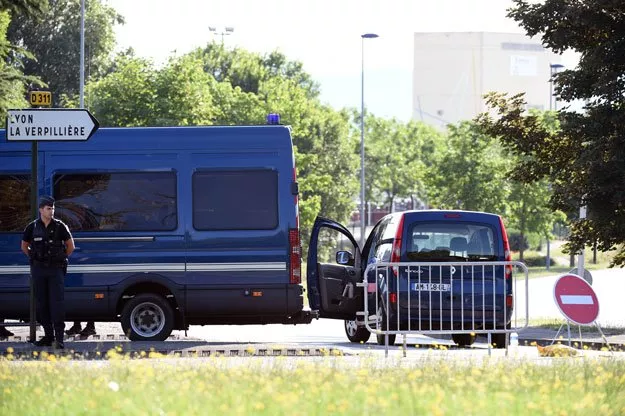 police officers stand guard at a cordon in saint quentin fallavier on june 27 2015 at the site where a decpaitated body was discovered following a suspected islamist attack on us owned air products factory french police interrogated a suspected islamist as they tried to piece together an attack in which the man put his boss 039 s severed head on display in the second jihadist attack to hit france in six months photo afp police officers stand guard at a cordon in saint quentin fallavier on june 27 2015 at the site where a decpaitated body was discovered following a suspected islamist attack on us owned air products factory french police interrogated a suspected islamist as they tried to piece together an attack in which the man put his boss 039 s severed head on display in the second jihadist attack to hit france in six months photo afp