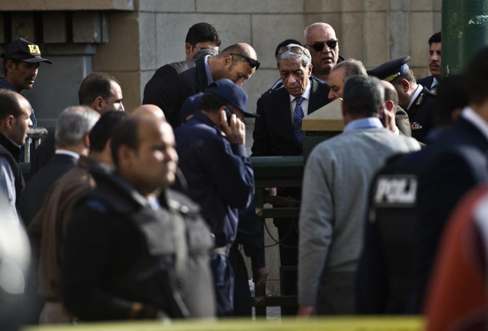 egyptian general prosecutor hisham barakat centre visits the site of an explosion outside the egyptian supreme court in down town cairo on march 2 2015 photo afp
