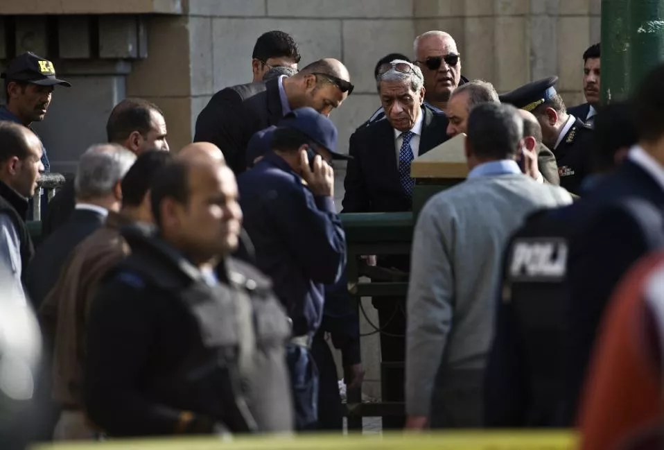 egyptian general prosecutor hisham barakat centre visits the site of an explosion outside the egyptian supreme court in down town cairo on march 2 2015 photo afp egyptian general prosecutor hisham barakat centre visits the site of an explosion outside the egyptian supreme court in down town cairo on march 2 2015 photo afp