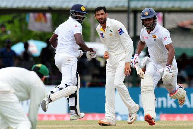 sri lankan cricketer dimuth karunaratne r and captain angelo mathews 2l run between the wickets as pakistan cricketer junaid khan 2r looks on during the final day of the second test cricket match between sri lanka and pakistan at the p sara oval cricket stadium in colombo on june 29 2015 photo afp sri lankan cricketer dimuth karunaratne r and captain angelo mathews 2l run between the wickets as pakistan cricketer junaid khan 2r looks on during the final day of the second test cricket match between sri lanka and pakistan at the p sara oval cricket stadium in colombo on june 29 2015 photo afp