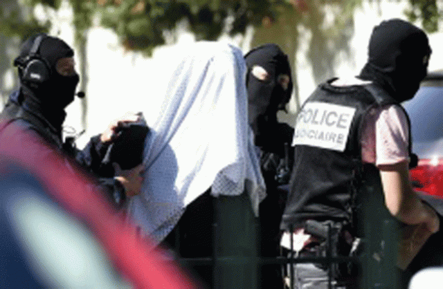 french police escort yassin salhi who decapitated his boss in an attack on a gas factory photo afp