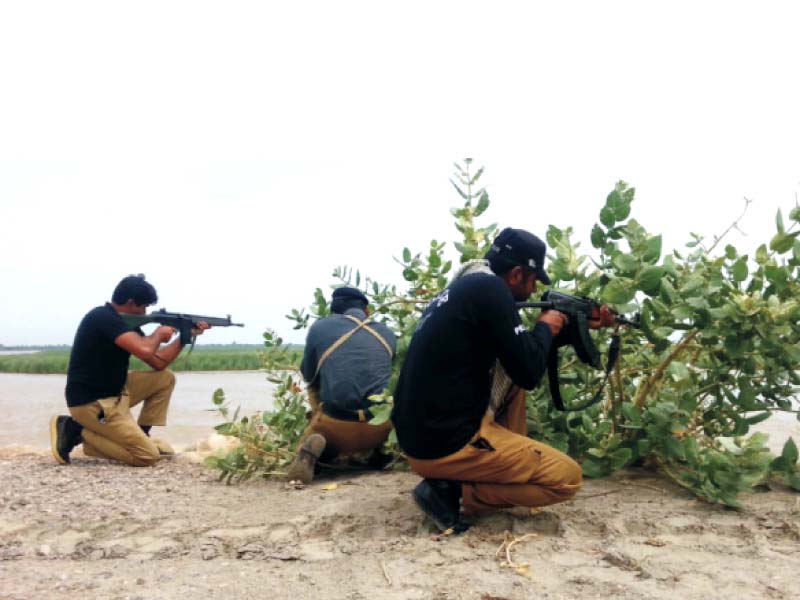 policemen exchange fire with the robbers near kacha hideout photo express