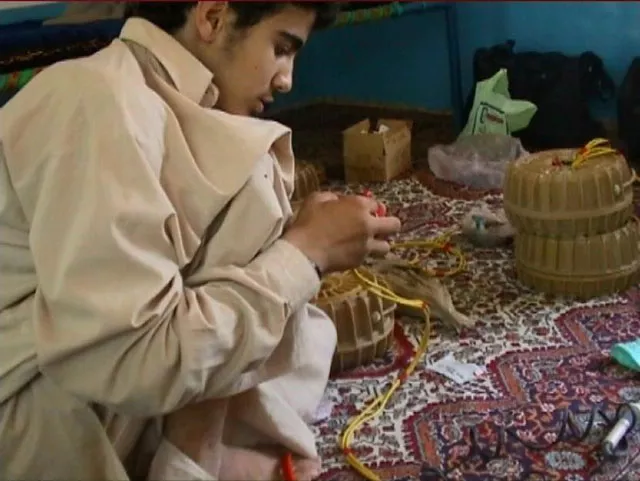 in this image released by the us defense press operations pentagon on october 31 2010 shows canadian omar khadr constructing an improvised explosive device photo afp in this image released by the us defense press operations pentagon on october 31 2010 shows canadian omar khadr constructing an improvised explosive device photo afp