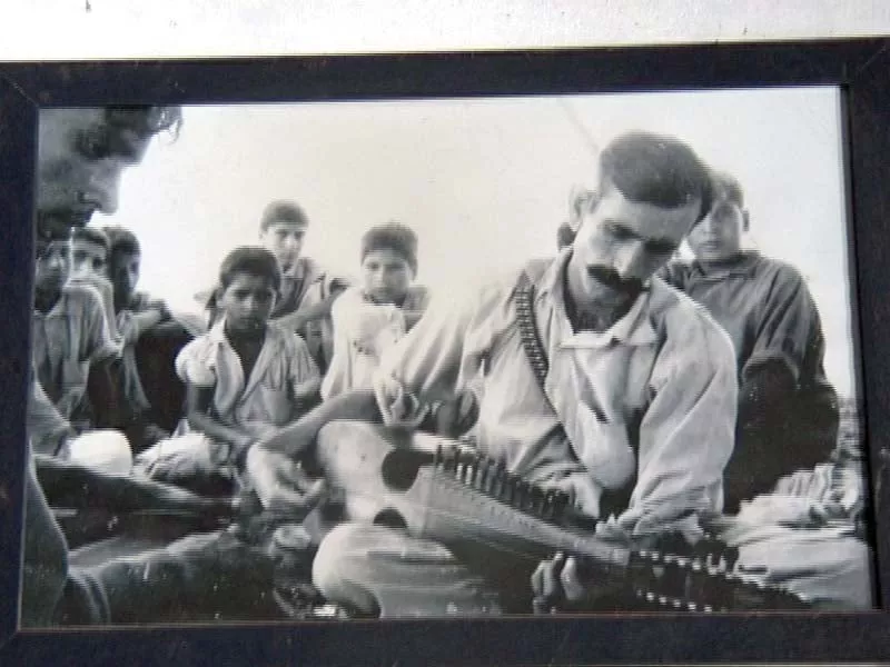 dost muhammad playing the rabab photo courtesy dost muhammad dost muhammad playing the rabab photo courtesy dost muhammad