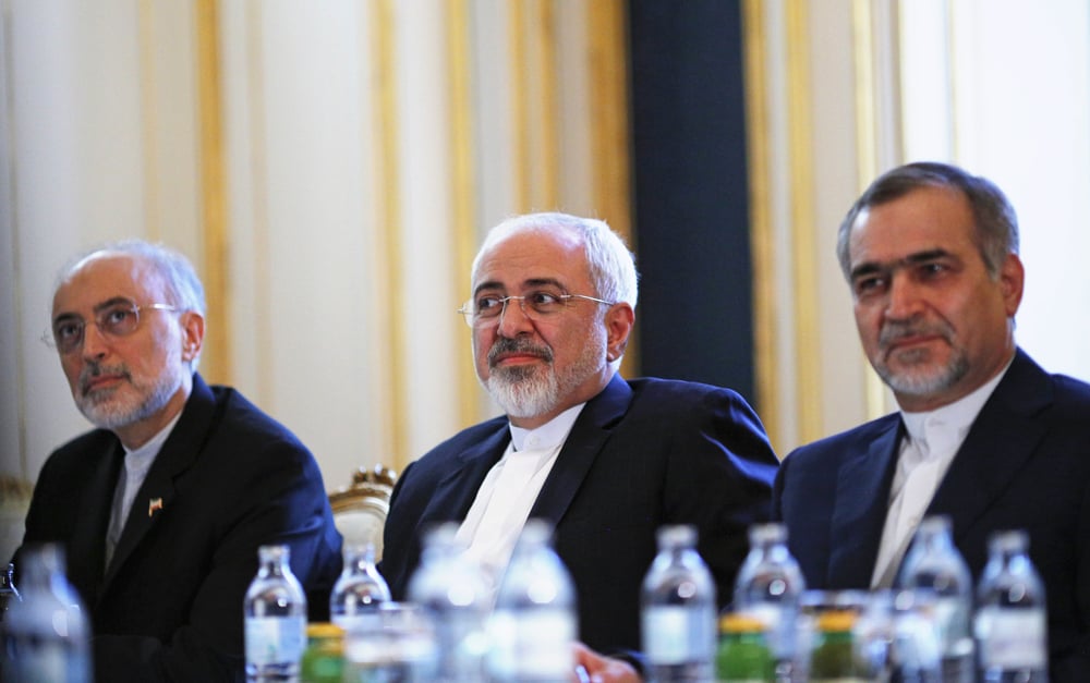 iranian foreign minister mohammad javad zarif c the head of the iranian atomic energy organization ali akbar salehi l and hossein fereydoon r brother and close aide to president hassan rouhani are pictured during a meeting with the us secretary of state in vienna on july 3 2015 photo afp