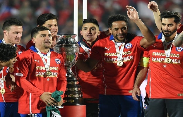 chilean players celebrate with the trophy of the 2015 copa america football championship in santiago chile on july 4 2015 photo afp