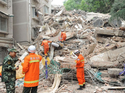 nine dead in china building collapse dozens rescued xinhua