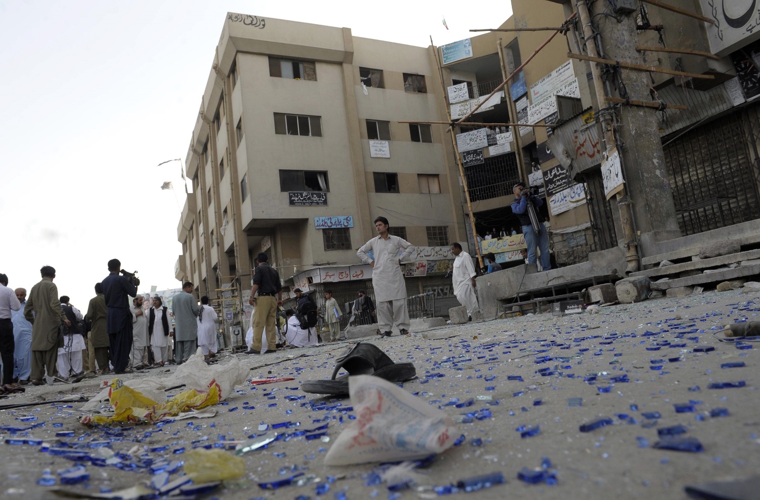 security personnel gather around the site of bomb explosion in quetta on july 5 2015 photo afp