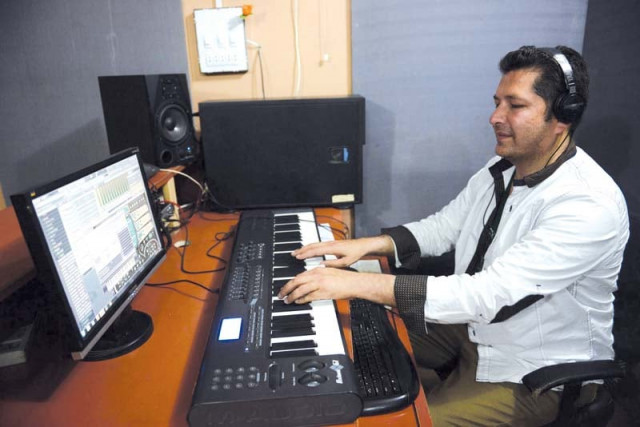 pakistani popular pashto singer bakhtiar khattak records a song at a studio in peshawar photo afp pakistani popular pashto singer bakhtiar khattak records a song at a studio in peshawar photo afp