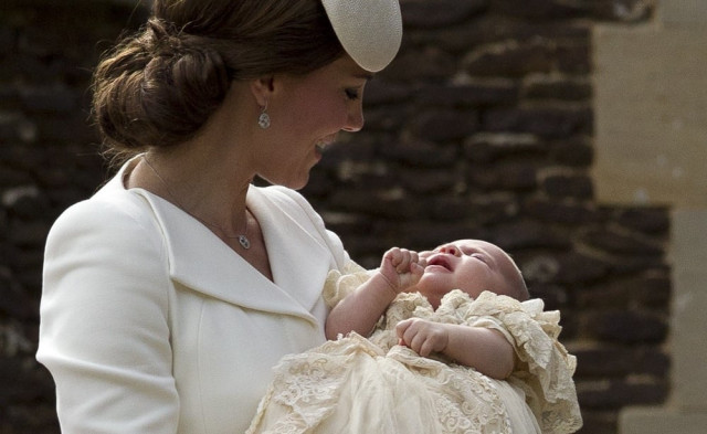 britain 039 s catherine duchess of cambridge carries her daughter princess charlotte of cambridge after taking her out of a pram as they arrive for charlotte 039 s christening at st mary magdalene church in sandringham england on july 5 2015 photo afp britain 039 s catherine duchess of cambridge carries her daughter princess charlotte of cambridge after taking her out of a pram as they arrive for charlotte 039 s christening at st mary magdalene church in sandringham england on july 5 2015 photo afp