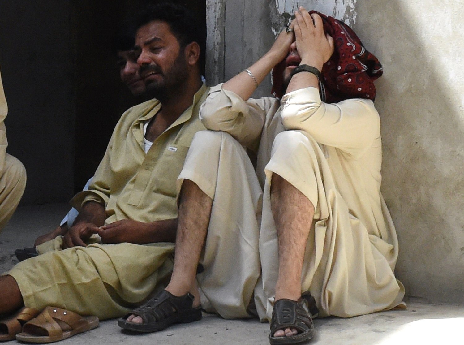 relatives mourn the killing of shia muslims killed in an attack by gunmen at a hospital in quetta on july 6 2015 photo afp