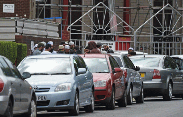 men congregate outside the markazi mosque in savile town dewsbury on july 5 2015 photo afp men congregate outside the markazi mosque in savile town dewsbury on july 5 2015 photo afp