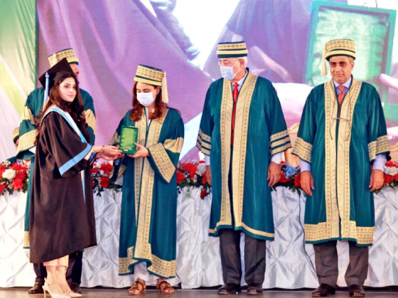 a student receives her degree at the 18th convocation of ziauddin university the university conferred degrees upon over 500 graduates on the occasion photo