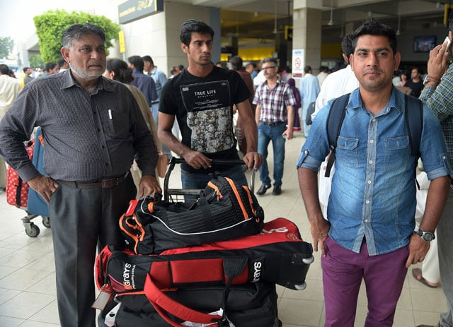 pakistani hockey captain mohammad imran l and team head coach shahnaz sheikh arrive at islamabad international airport in islamabad on july 7 2015 from belgium after playing in the world hockey league photo afp pakistani hockey captain mohammad imran l and team head coach shahnaz sheikh arrive at islamabad international airport in islamabad on july 7 2015 from belgium after playing in the world hockey league photo afp