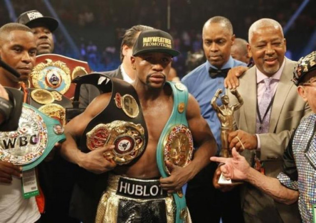 floyd mayweather jr of the u s poses with his title belts after defeating manny pacquiao of the philippines in their welterweight wbo wbc and wba title fight in las vegas on may 2 2015 photo reuters floyd mayweather jr of the u s poses with his title belts after defeating manny pacquiao of the philippines in their welterweight wbo wbc and wba title fight in las vegas on may 2 2015 photo reuters