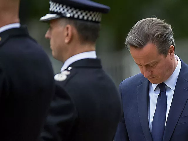 british prime minister david cameron r is pictured as he takes part in a wreath laying ceremony in london 039 s hyde park on july 7 2015 in memory of the 52 victims of the 7 7 london attacks photo afp british prime minister david cameron r is pictured as he takes part in a wreath laying ceremony in london 039 s hyde park on july 7 2015 in memory of the 52 victims of the 7 7 london attacks photo afp