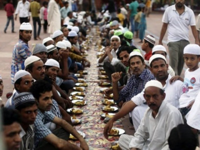 bangladeshi buddhist monks feed fasting muslims over ramazan