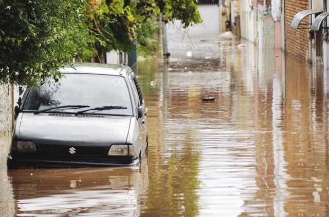 stagnant rainwater in a street in abbottabad photo online stagnant rainwater in a street in abbottabad photo online
