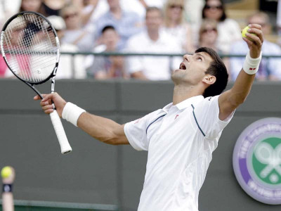 wimbledon djokovic enters last eight by the skin of his teeth