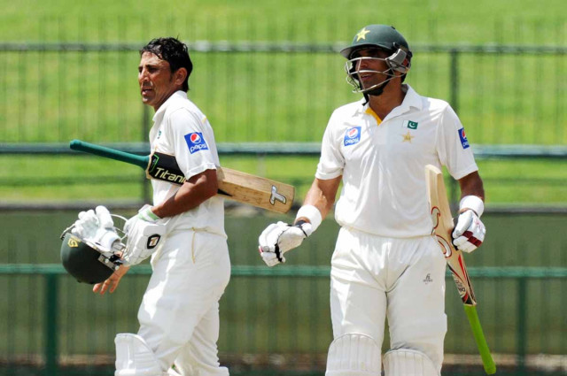 younus khan and misbahul haq after clinching the third test against sri lanka photo afp younus khan and misbahul haq after clinching the third test against sri lanka photo afp