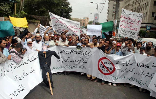traders protesting against the imposition of 0 6 withholding tax on banking transactions photo ppi traders protesting against the imposition of 0 6 withholding tax on banking transactions photo ppi
