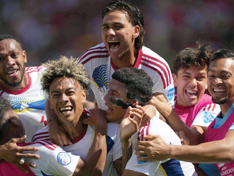 eduard bello of venezuela celebrates with teammates after scoring the team s first goal during the conmebol copa america 2024 group b match photo afp