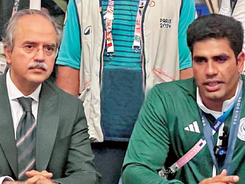 pakistani ambassador in paris h e asim iftikhar ahmad left is seen with olympic record holder javelin thrower arshad nadeem at a reception on saturday photo afp