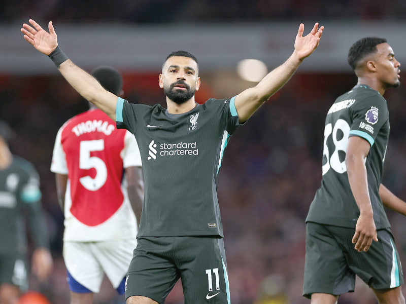 mohamed salah s equaliser salvaged liverpool a 2 2 draw at premier league title rivals arsenal photo afp