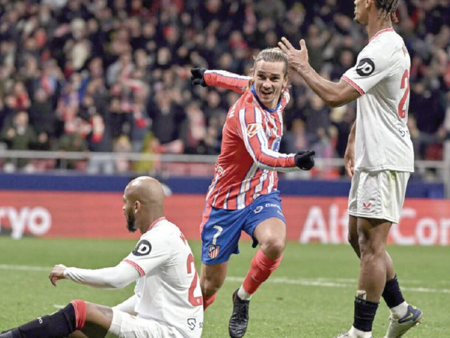 atletico madrid s french forward antoine griezmann 2r celebrates scoring their fourth goal in the wild win over sevilla photo afp atletico madrid s french forward antoine griezmann 2r celebrates scoring their fourth goal in the wild win over sevilla photo afp