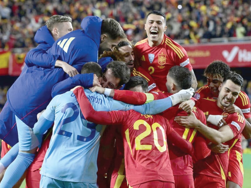 spain s players celebrate after the uefa nations league quarter final win over netherlands in valencia photo afp