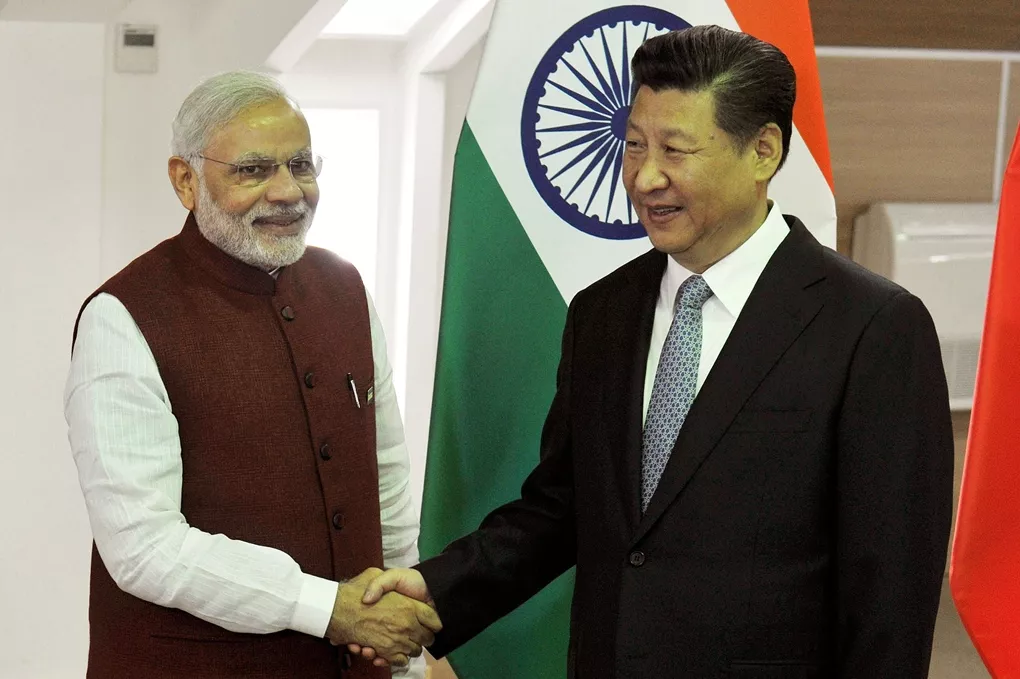 in this handout photograph released by the indian press information bureau pib on july 8 2015 india 039 s prime minister narendra modi l shakes hands with china 039 s president xi jinping ahead of a meeting in ufa on the sidelines of the brics emerging economies summit photo afp in this handout photograph released by the indian press information bureau pib on july 8 2015 india 039 s prime minister narendra modi l shakes hands with china 039 s president xi jinping ahead of a meeting in ufa on the sidelines of the brics emerging economies summit photo afp