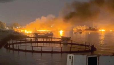 smoke rises from a port near strait of hormuz following a us strike in kuhestak hormozgan province iran photo reuters