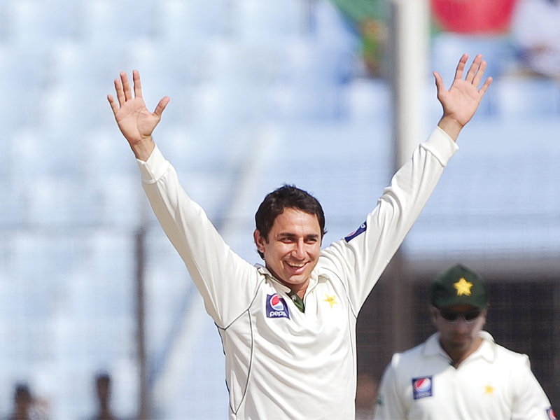 a file photo of saeed ajmal celebrating after taking a wicket photo afp