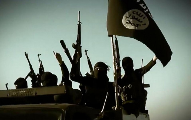 an image grab taken from a propaganda video released on march 17 2014 by the islamic state is group 039 s al furqan media allegedly shows is fighters riding in a vehicle an undisclosed location in iraq 039 s anbar province photo afp an image grab taken from a propaganda video released on march 17 2014 by the islamic state is group 039 s al furqan media allegedly shows is fighters riding in a vehicle an undisclosed location in iraq 039 s anbar province photo afp
