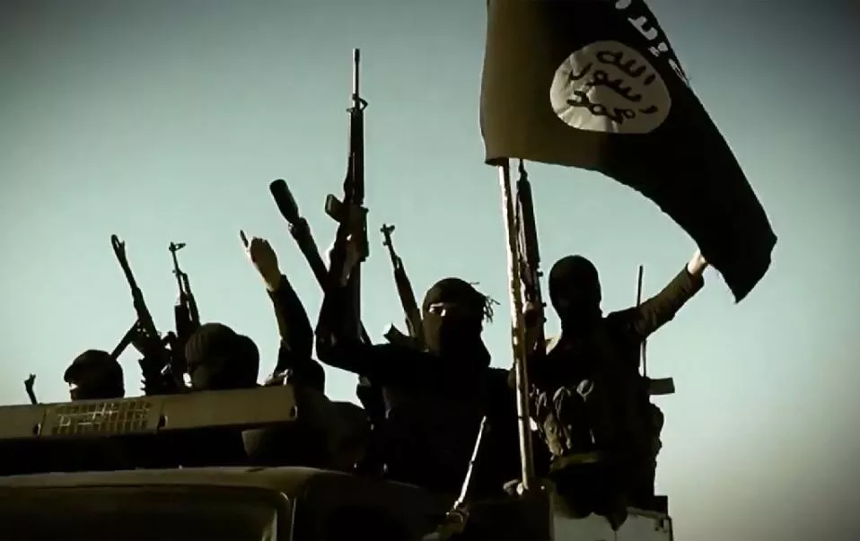 an image grab taken from a propaganda video released on march 17 2014 by the islamic state is group 039 s al furqan media allegedly shows is fighters riding in a vehicle an undisclosed location in iraq 039 s anbar province photo afp an image grab taken from a propaganda video released on march 17 2014 by the islamic state is group 039 s al furqan media allegedly shows is fighters riding in a vehicle an undisclosed location in iraq 039 s anbar province photo afp