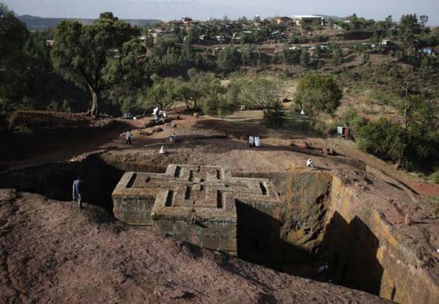 a man stands above the bet medhane alem rock church during an orthodox good friday celebration in lalibela in this may 3 2013 file photo photo reuters