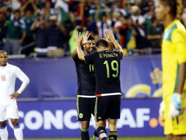 oribe peralta scored a hat trick as mexico eased to a 6 0 rout over cuba photo afp oribe peralta scored a hat trick as mexico eased to a 6 0 rout over cuba photo afp