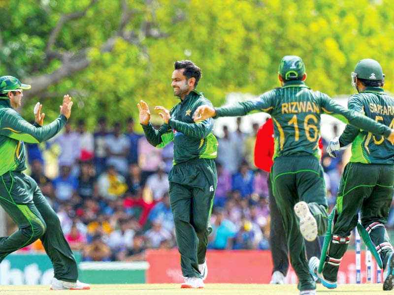 hafeez was pakistan s best bowler and best batsman as he almost single handedly guided pakistan to victory claiming four wickets and then following it up with a century photo afp