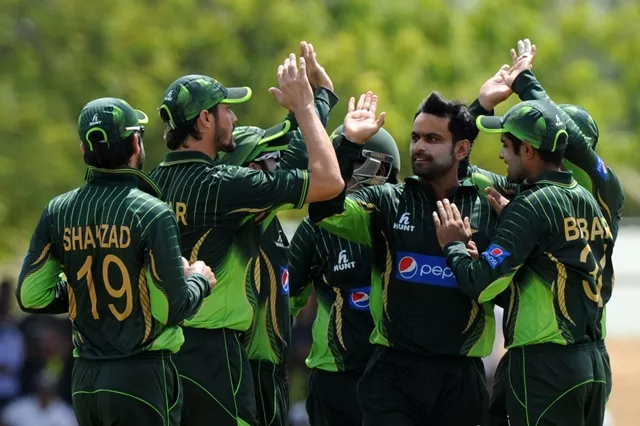 pakistan cricketer mohammad hafeez 3r celebrates with teammates after he dismissed sri lankan batsman kusal perera during the first one day international odi cricket match between sri lanka and pakistan at the rangiri dambulla international cricket stadium in dambulla some 150kms north of colombo on july 11 2015 photo afp pakistan cricketer mohammad hafeez 3r celebrates with teammates after he dismissed sri lankan batsman kusal perera during the first one day international odi cricket match between sri lanka and pakistan at the rangiri dambulla international cricket stadium in dambulla some 150kms north of colombo on july 11 2015 photo afp