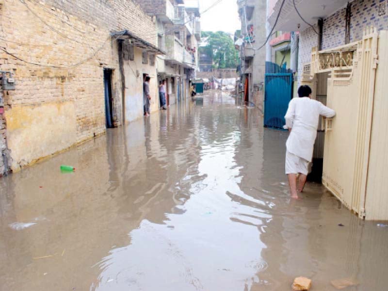 rainwater has entered houses in the amarpura neighbourhood of rawalpindi many low lying areas in the city have been inundated by the ongoing rains photo nni