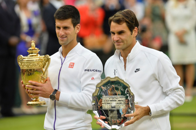 serbia 039 s novak djokovic l and switzerland 039 s roger federer hold their trophies during the presentation after their men 039 s singles match on day thirteen of the 2014 wimbledon championships at the all england tennis club in wimbledon southwest london on july 12 2015 photo afp serbia 039 s novak djokovic l and switzerland 039 s roger federer hold their trophies during the presentation after their men 039 s singles match on day thirteen of the 2014 wimbledon championships at the all england tennis club in wimbledon southwest london on july 12 2015 photo afp