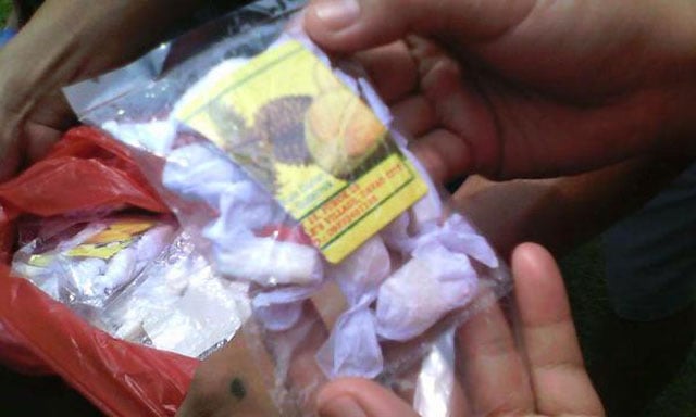 at least 1 925 people in southern philippines mostly schoolchildren fall sick after eating fruit flavoured candy