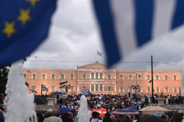 pro euro protesters demonstrate in front of the parliament building in athens photo afp pro euro protesters demonstrate in front of the parliament building in athens photo afp