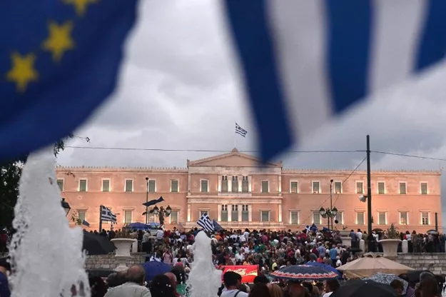 pro euro protesters demonstrate in front of the parliament building in athens photo afp pro euro protesters demonstrate in front of the parliament building in athens photo afp