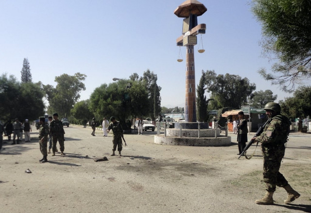 afghan security personnel inspect site of the suicide attack photo reuters afghan security personnel inspect site of the suicide attack photo reuters